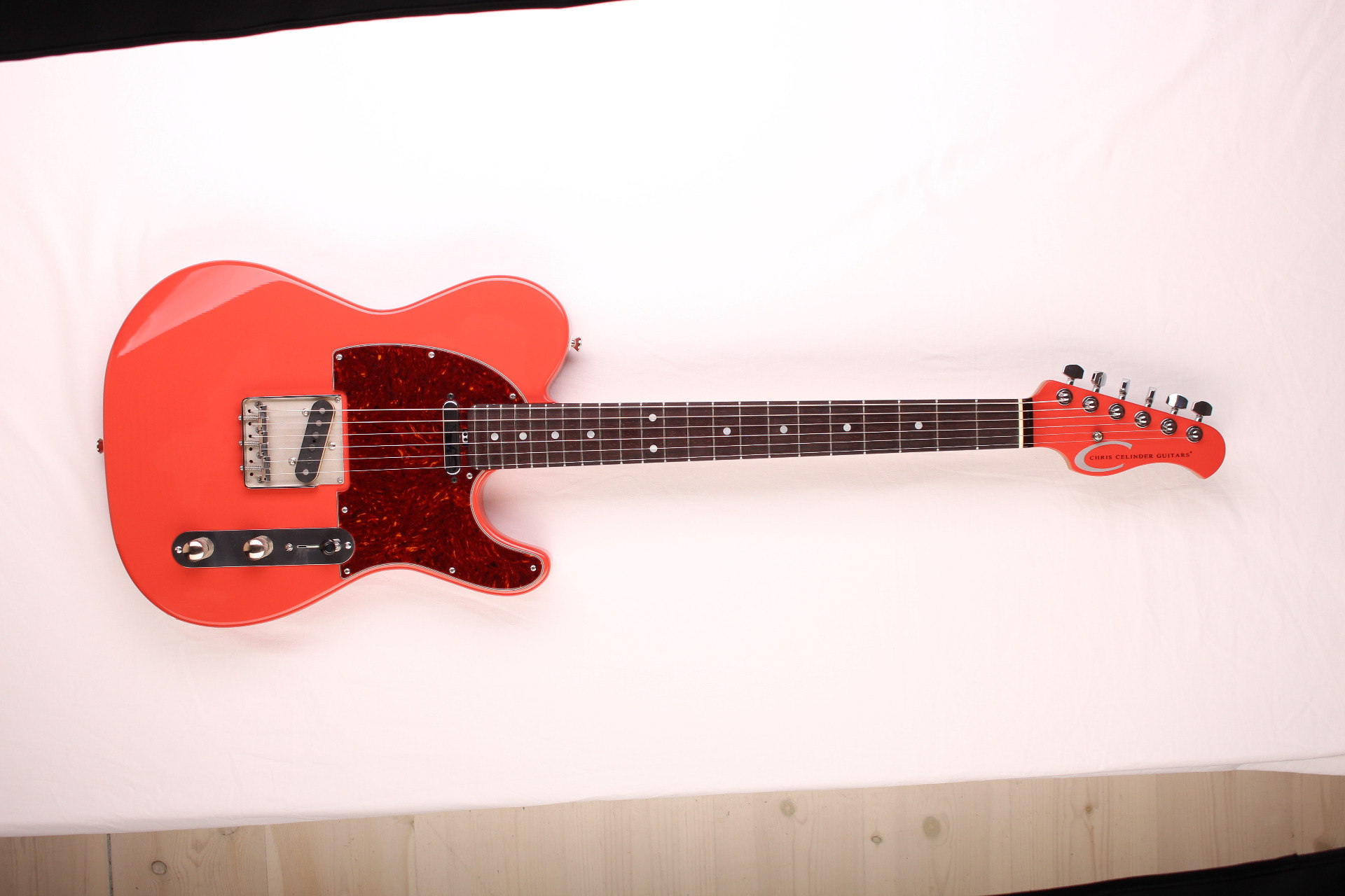 The Chris Celinder T CLASSIC in Faded Fiesta Red with Matching Headstock.